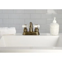 Kingston Brass Restoration 4-Inch Centerset Deck Mount Bathroom Faucet