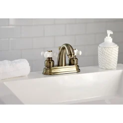 Kingston Brass Restoration 4-Inch Centerset Deck Mount Bathroom Faucet