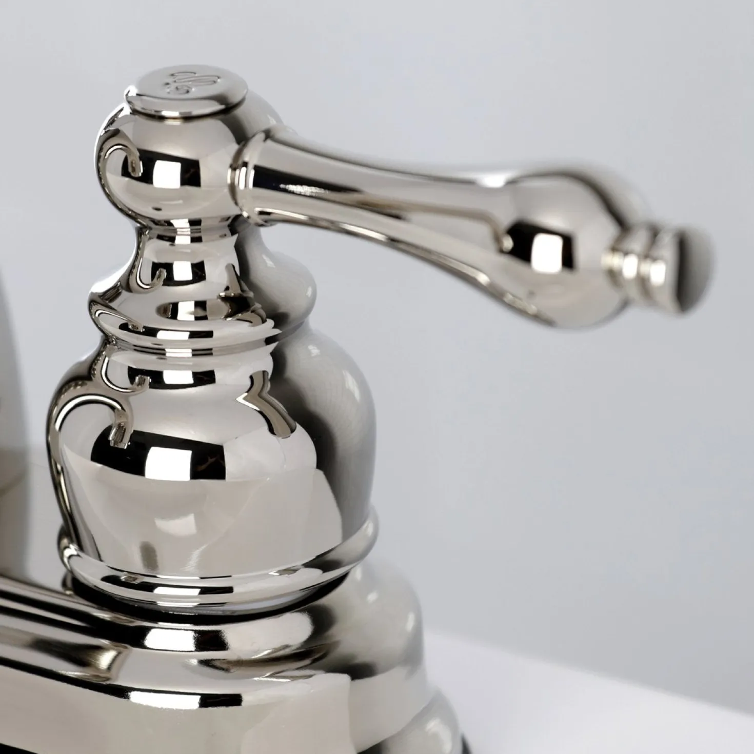 Kingston Brass Restoration 4-Inch Centerset Bathroom Faucet