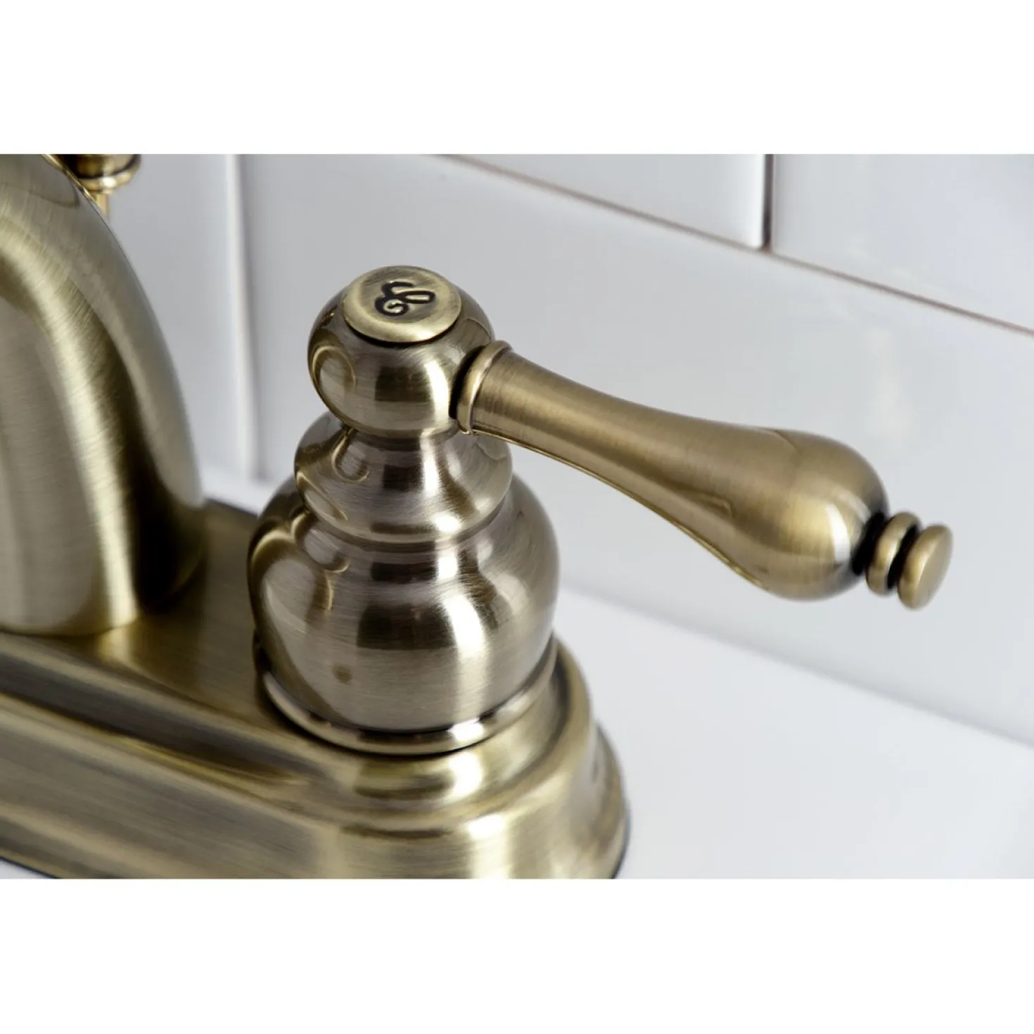 Kingston Brass Restoration 4-Inch Centerset Bathroom Faucet
