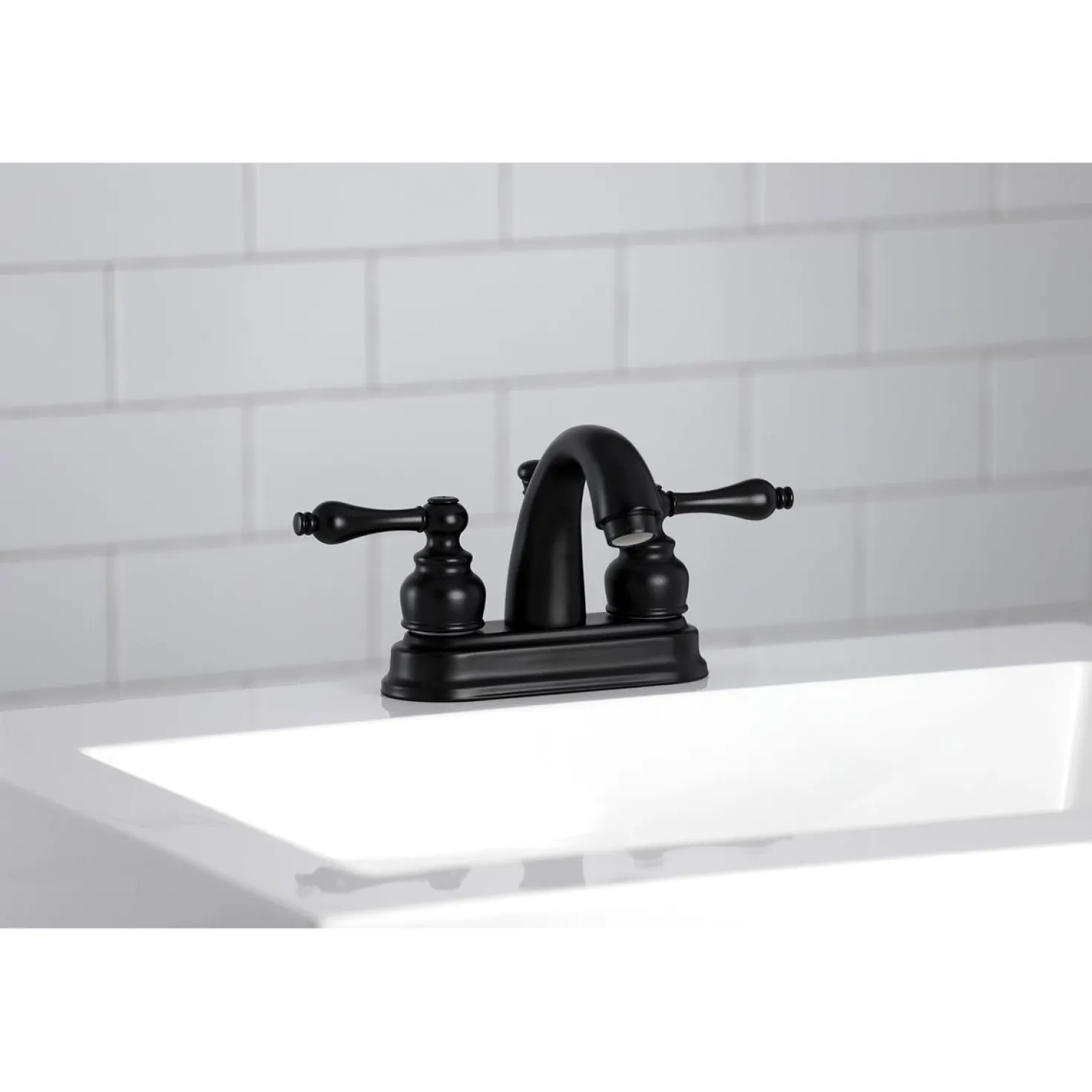 Kingston Brass Restoration 4-Inch Centerset Bathroom Faucet
