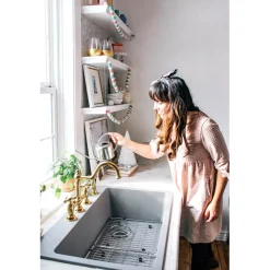 Kingston Brass Restoration Kitchen Bridge Faucet with Brass Sprayer
