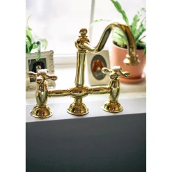 Kingston Brass Restoration Kitchen Bridge Faucet with Brass Sprayer