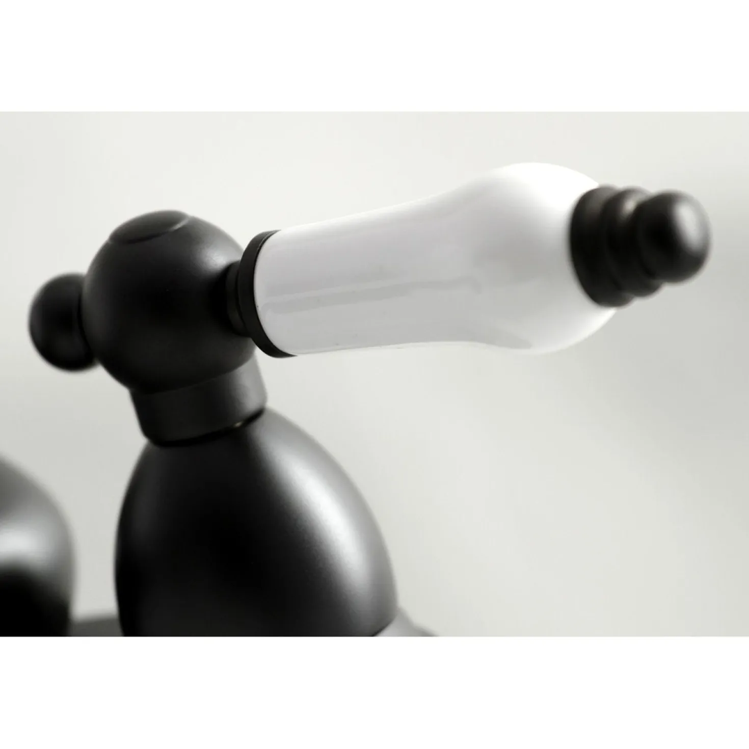 Kingston Brass Restoration Lever-Handle 4-Inch Centerset Bathroom Faucet