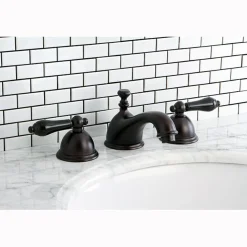 Kingston Brass Restoration Onyx Widespread Lavatory Faucet with Black Porcelain Lever Handle
