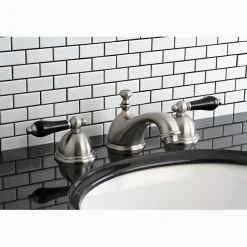 Kingston Brass Restoration Onyx Widespread Lavatory Faucet with Black Porcelain Lever Handle