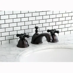 Kingston Brass Restoration Onyx Widespread Lavatory Faucet with Black Porcelain Cross Handle