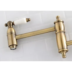 Kingston Brass Restoration Wall Mount Single Hole Pot Filler Kitchen Faucet