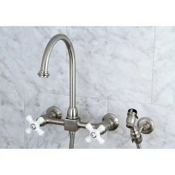 Kingston Brass Restoration Wall Mount 8" Centerset Kitchen Faucet with Brass Sprayer
