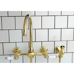 Kingston Brass Restoration Wall Mount 8-Inch Centerset Kitchen Faucet with Brass Sprayer