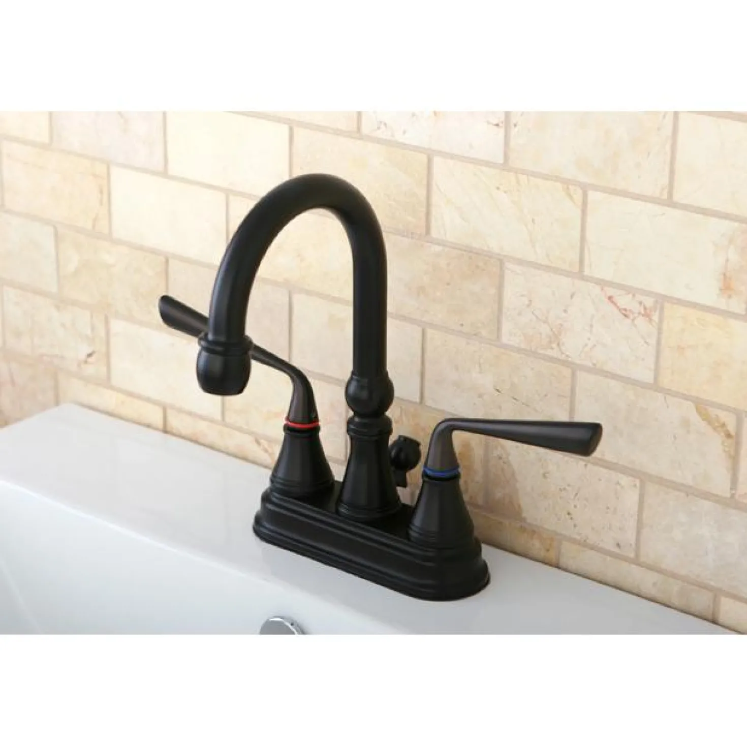 Kingston Brass Silver Sage Two Handle 4" Centerset Lavatory Faucet with Brass Pop-up in Oil Rubbed Bronze