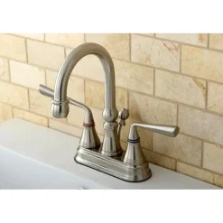 Kingston Brass Silver Sage Two Handle 4" Centerset Lavatory Faucet with Brass Pop-up in Satin Nickel
