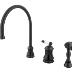 Kingston Brass Single Handle Widespread Kitchen Faucet with Brass Sprayer and Porcelain Lever Handle