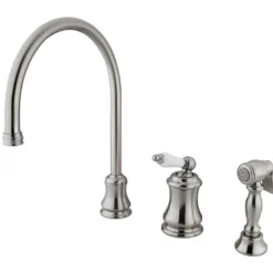Kingston Brass Single Handle Widespread Kitchen Faucet with Brass Sprayer and Porcelain Lever Handle