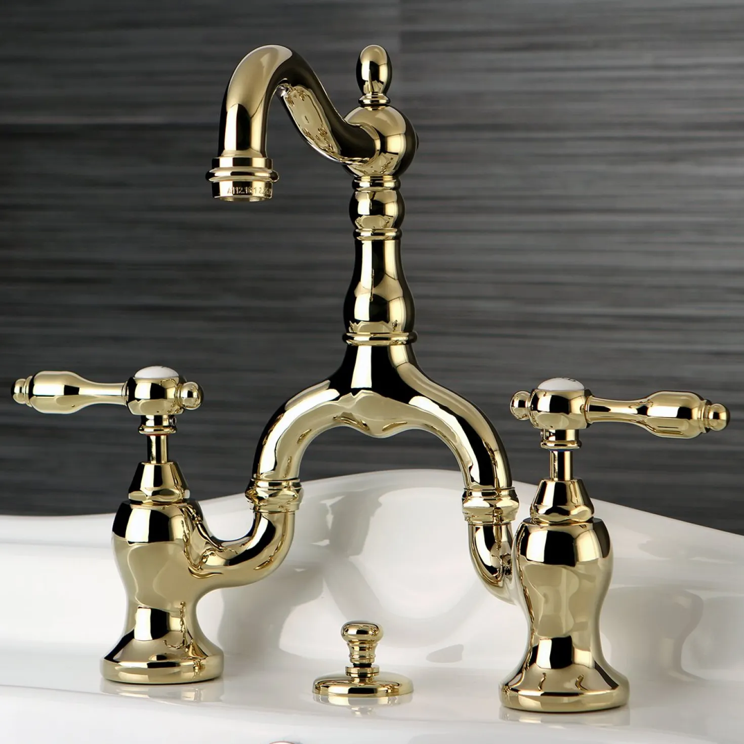 Kingston Brass Tudor Bridge Bathroom Faucet