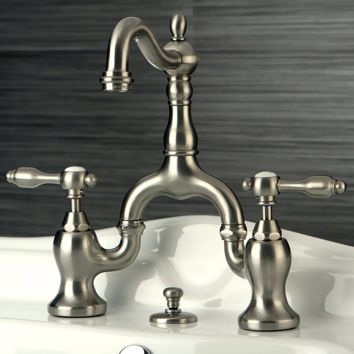 Kingston Brass Tudor Bridge Bathroom Faucet