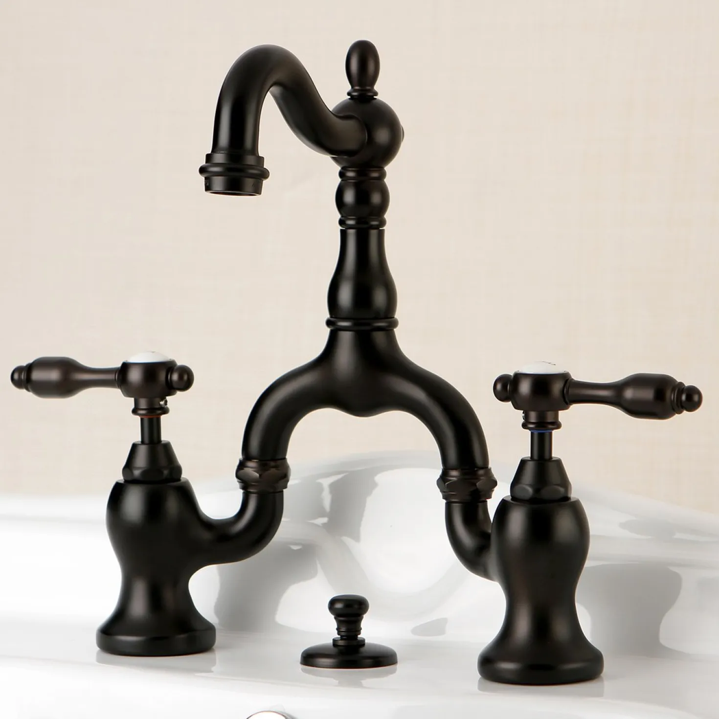 Kingston Brass Tudor Bridge Bathroom Faucet
