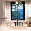 Kingston Brass Tudor Bridge Kitchen Faucet with Brass Sprayer