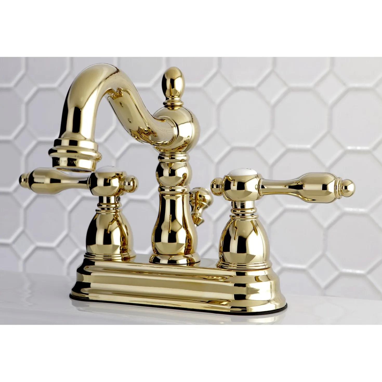 Kingston Brass Tudor Classic 4" Center Lavatory Faucet with Brass Pop-up