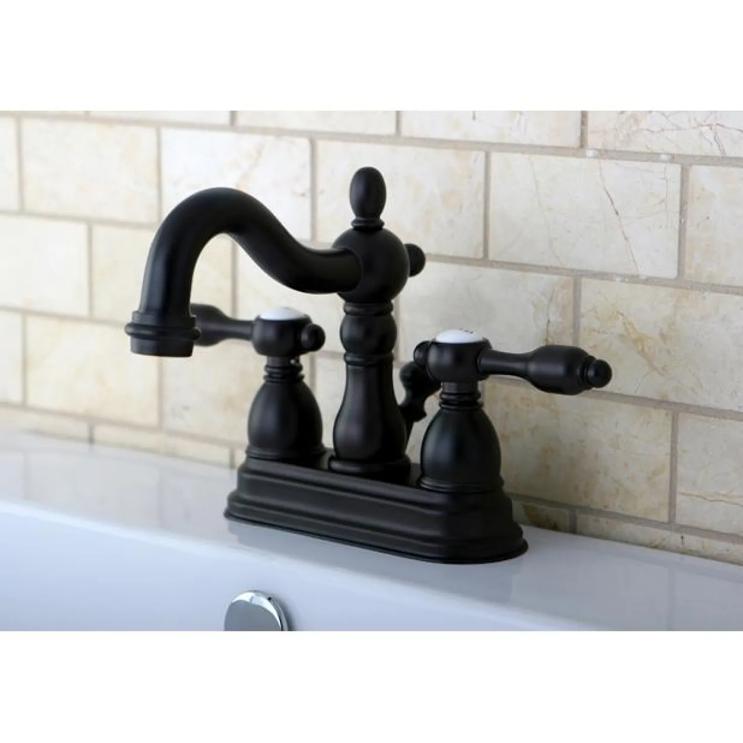Kingston Brass Tudor Classic 4" Center Lavatory Faucet with Brass Pop-up