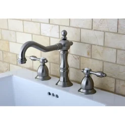 Kingston Brass Tudor Classic Widespread Lavatory Faucet with Brass Pop-up