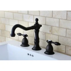 Kingston Brass Tudor Classic Widespread Lavatory Faucet with Brass Pop-up