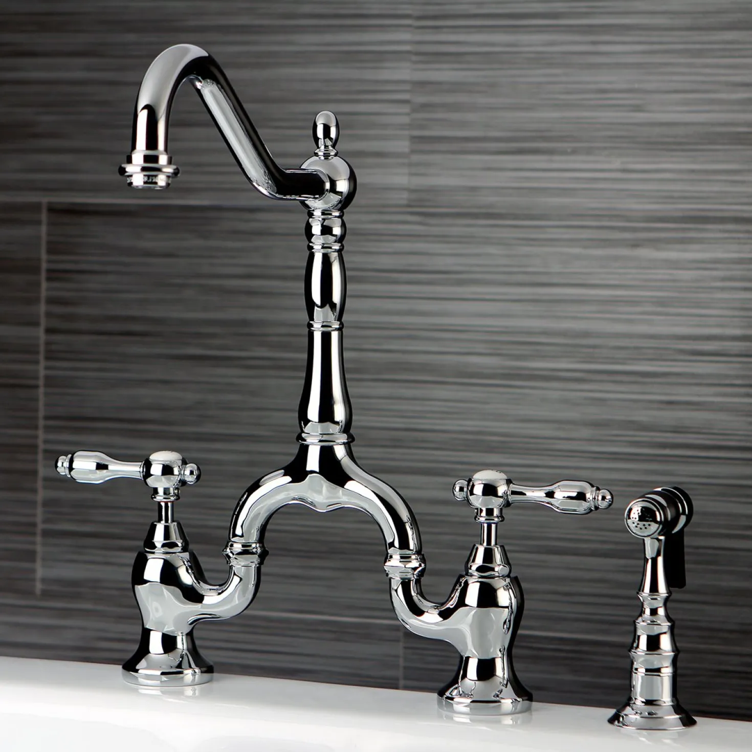 Kingston Brass Tudor Deck Mount Bridge Kitchen Faucet with Brass Sprayer