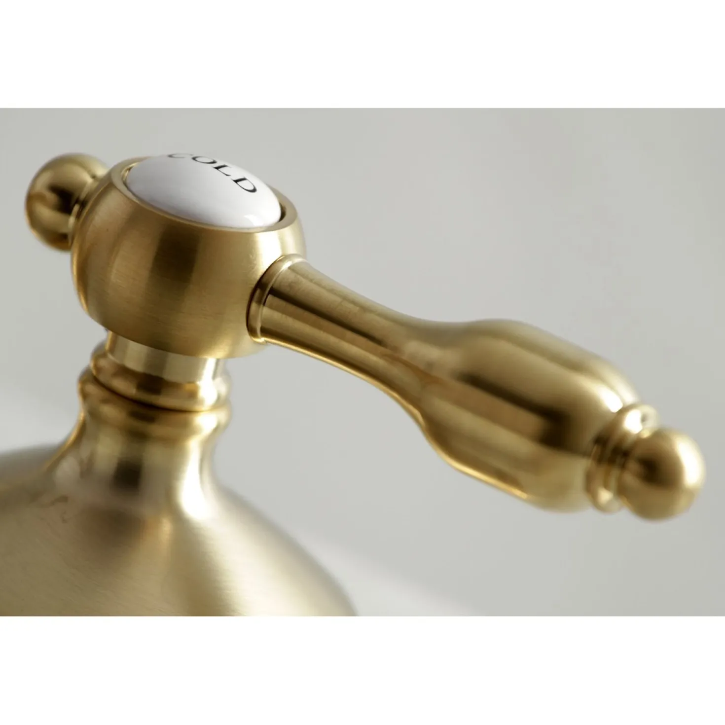 Kingston Brass Tudor Deck Mount 8-Inch Widespread Bathroom Faucet