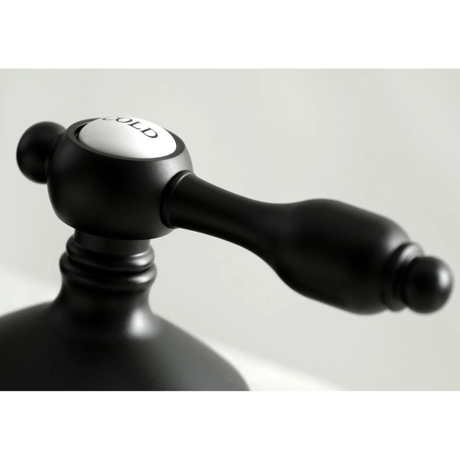 Kingston Brass Tudor Deck Mount 8-Inch Widespread Bathroom Faucet
