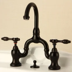 Kingston Brass Tudor Deck Mount Bridge Bathroom Faucet