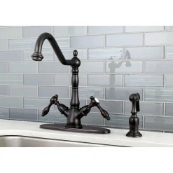 Kingston Brass Tudor Mono Deck Mount Kitchen Faucet with Brass Sprayer
