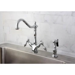 Kingston Brass Tudor Mono Deck Mount Kitchen Faucet with Brass Sprayer