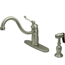 Kingston Brass Victorian Single Handle Kitchen Faucet with Brass Sprayer and Porcelain Lever Handle
