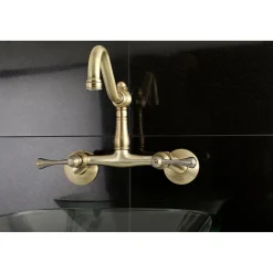 Kingston Brass Vintage 6-Inch Adjustable Center Wall Mount Kitchen Faucet