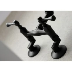 Kingston Brass Vintage 6-Inch Adjustable Center Wall Mount Kitchen Faucet
