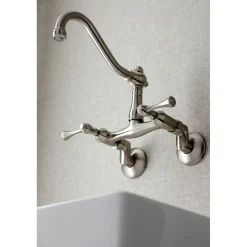 Kingston Brass Vintage 6-Inch Adjustable Center Wall Mount Kitchen Faucet