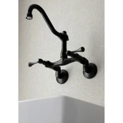 Kingston Brass Vintage 6-Inch Adjustable Center Wall Mount Kitchen Faucet