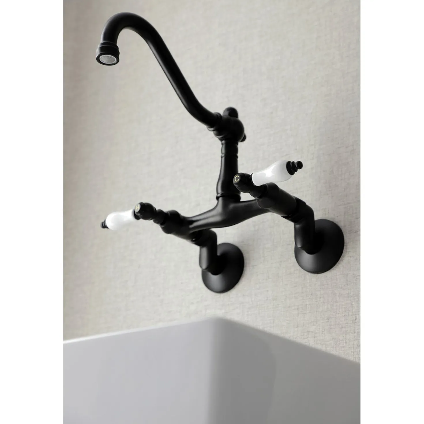 Kingston Brass Vintage Wall Mount 6" Adjustable Center Kitchen Faucet