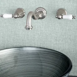 Kingston Brass Vintage Wall Mount 2-Handle Bathroom Faucet
