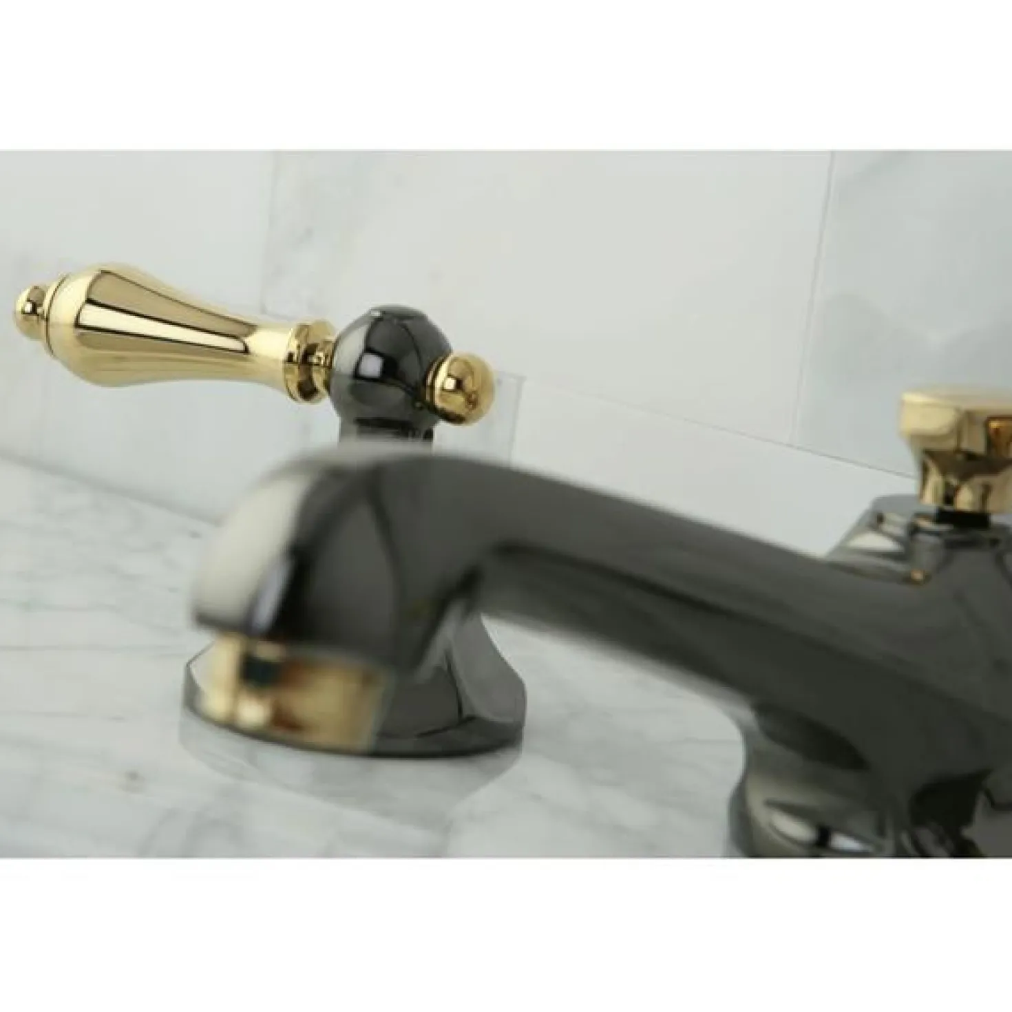 Kingston Brass Water Onyx 8" to 16" Widespread Three Hole Lavatory Faucet with Brass Pop-up Drain