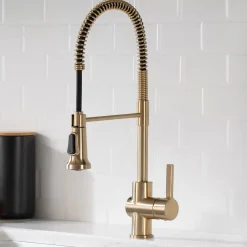 KRAUS Britt Single Handle Commercial Kitchen Faucet with Deck Plate and Soap Dispenser in Spot Free Antique Champagne Bronze