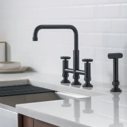 KRAUS Urbix Bridge Kitchen Faucet with Side Sprayer in Matte Black
