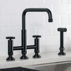 KRAUS Urbix Bridge Kitchen Faucet with Side Sprayer in Matte Black