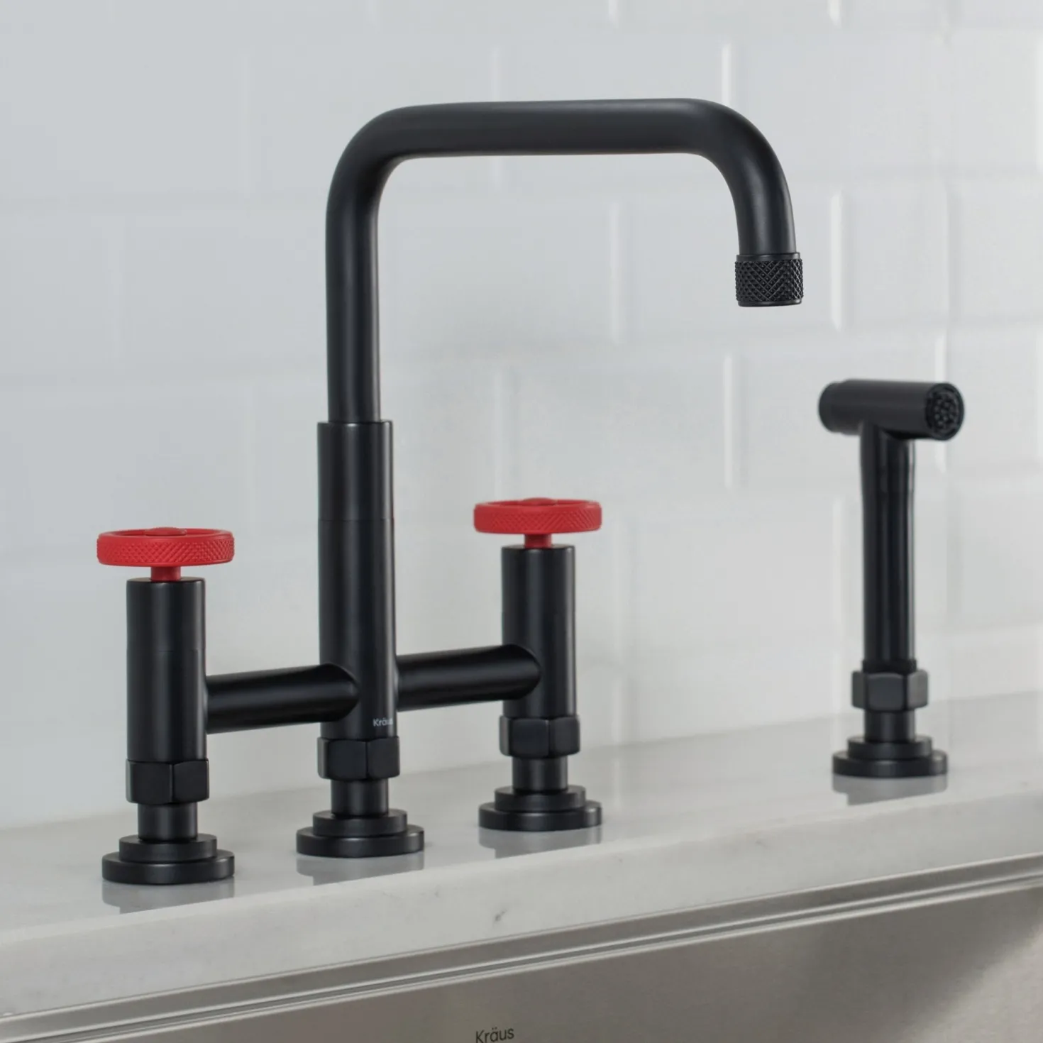 KRAUS Urbix Bridge Kitchen Faucet with Side Sprayer in Matte Black/Red