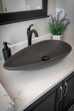 Pod Shaped Vessel Sink in Honed Lava Stone