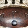 Premier Copper Products Oval Fleur De Lis Under Counter Hammered Copper Sink