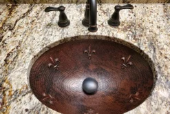 Premier Copper Products Oval Fleur De Lis Under Counter Hammered Copper Sink